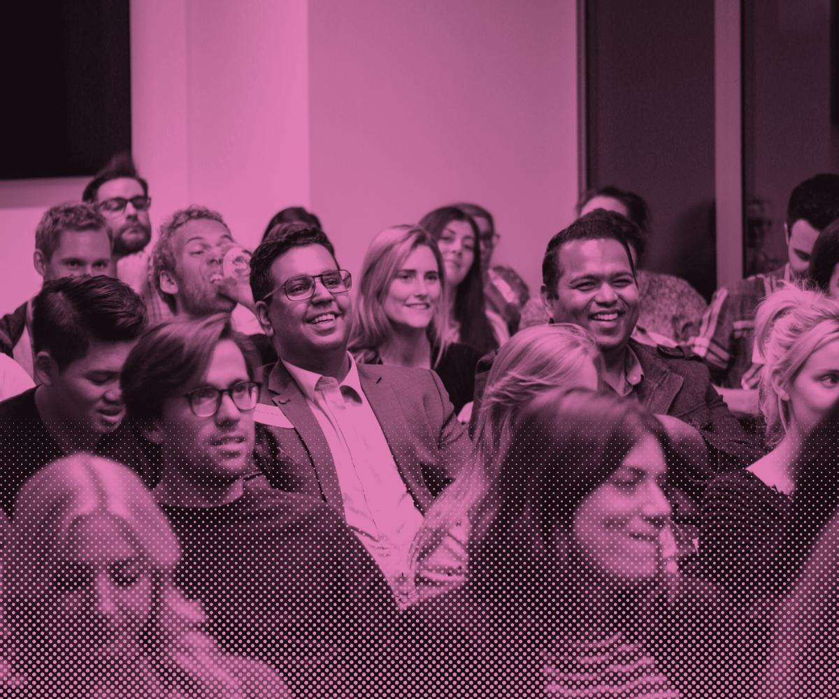 group of engaged people listening to a presentation